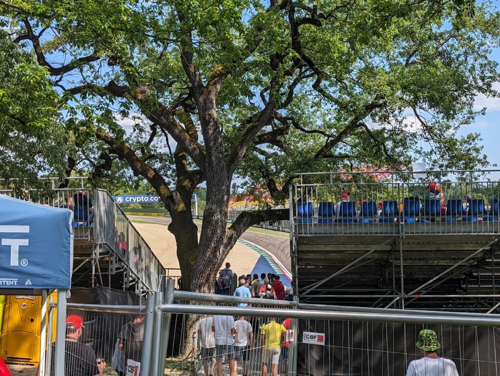 Acque Minerali 4 grandstands are temporary and provide some shade being nestled into the trees.