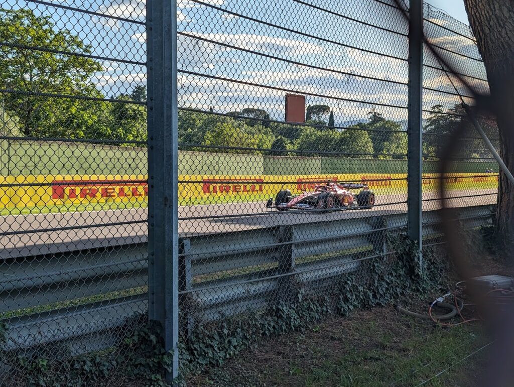A Ferrari team driver enters the Gresini chicane as viewed from the GA area.