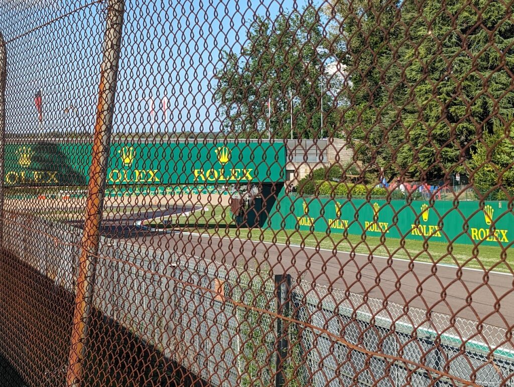 A view towards turn 17 and the Rivazza 2 grandstands with the sight-limiting bridge crossing the track.