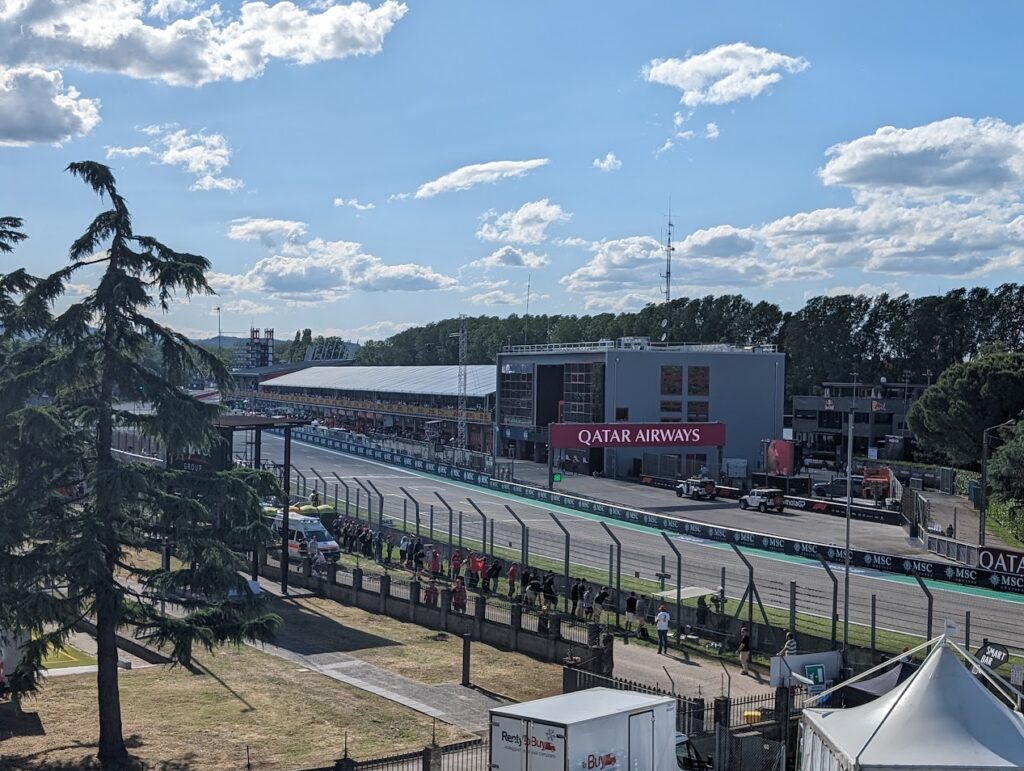 Elevated view of the pit lane and start/finish line from the western edge of the Rivazza 1 grandstands.