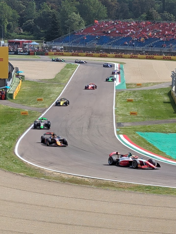 The view from Tosa as cars exit the Villeneuve chicane and speed towards the Tosa corner.