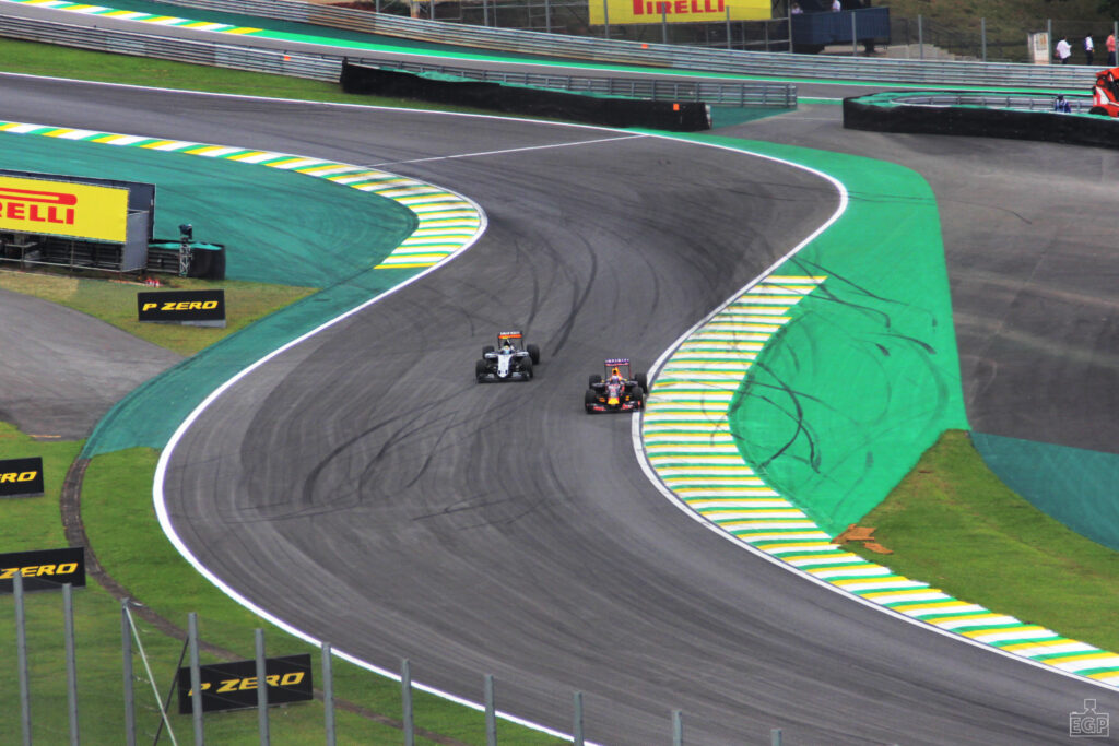 A head to head battle through Interlagos ess bends.