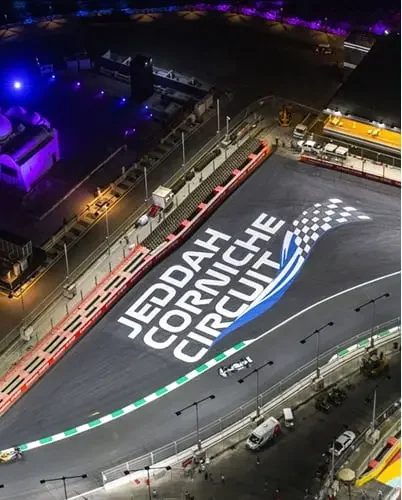 Looking down on the Jeddah Corniche Circuit logo on track.