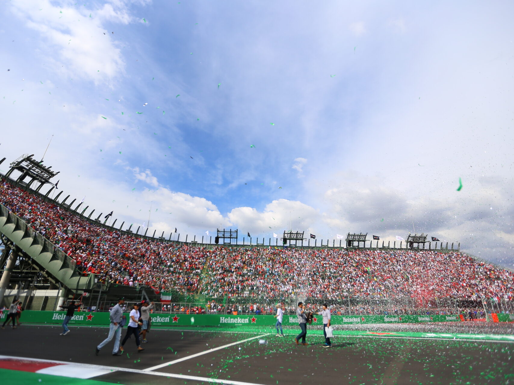 Iconic view of the Mexico City stadium grandstands from the track level.