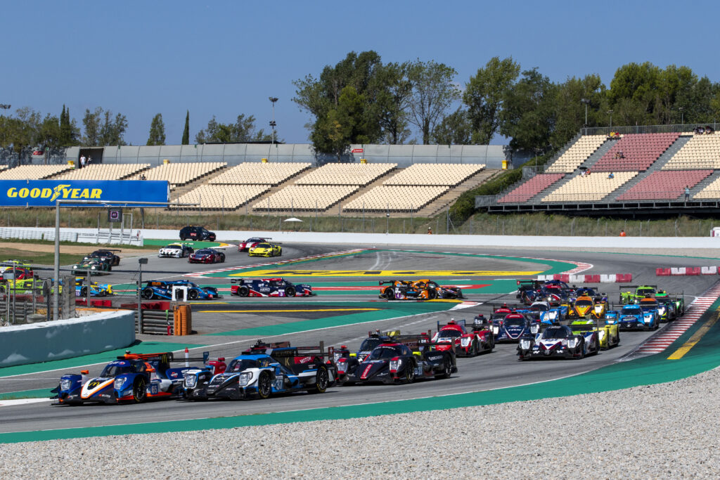 United Auto Sports ELM 2022.  Drivers exiting final turn into the main straight.