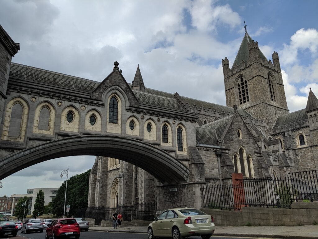 Dublinia museum bridge over busy street in Dublin Ireland.