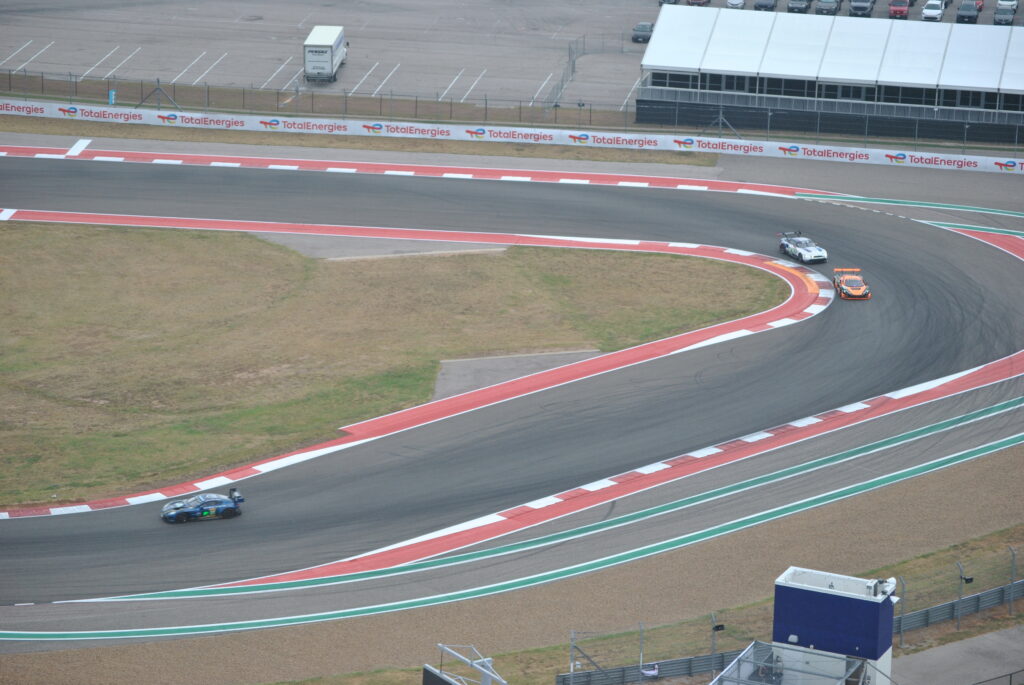 LMGT3 cars moving from T13 into T14 viewed from the COTA Tower.