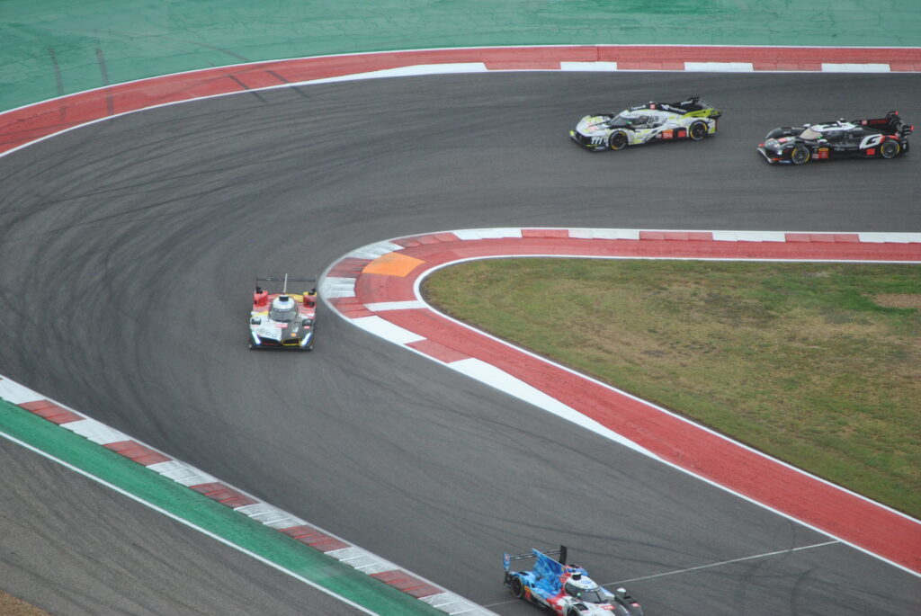 Close up view of Hypercars taking T15 viewed from the COTA Tower.