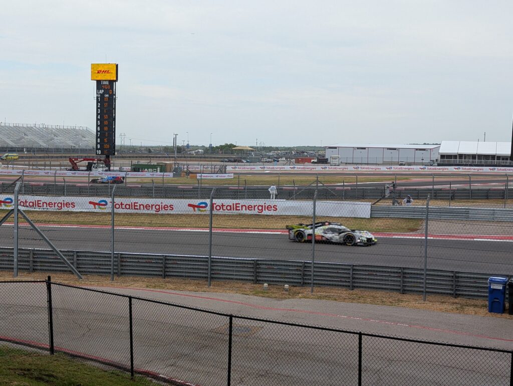 Peugeot Hypercar entering T16 viewed from the T16 GA area.