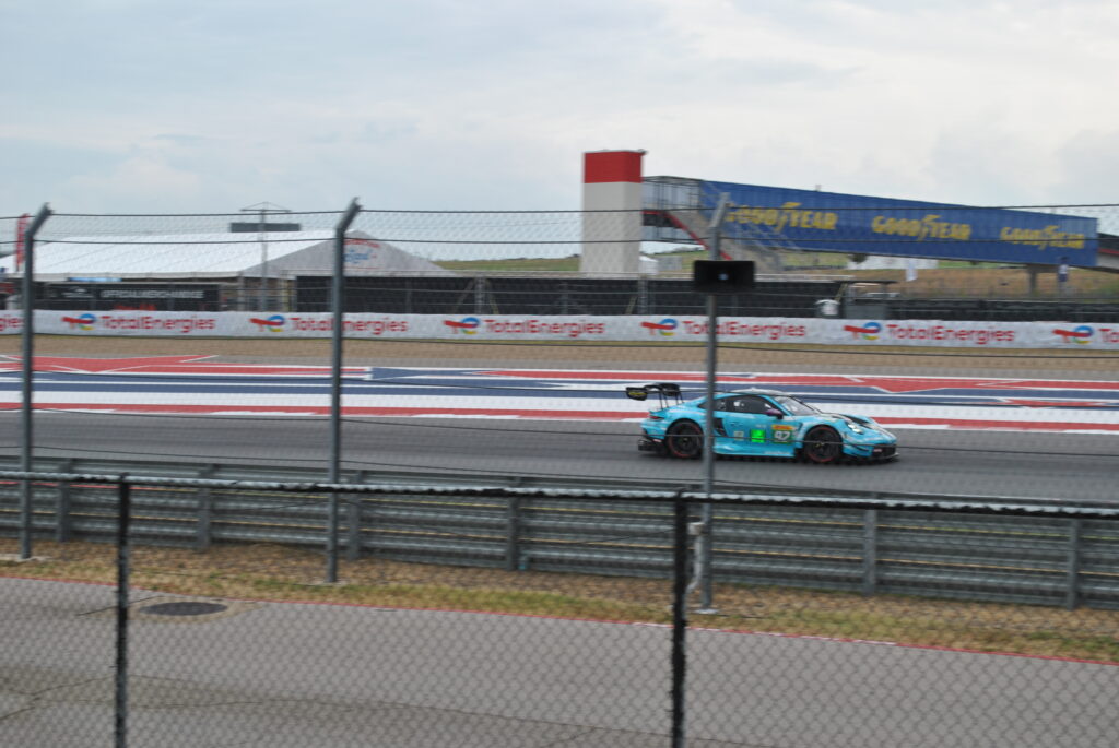 Manthey Porsche 92 through the fence from the T16 GA area.