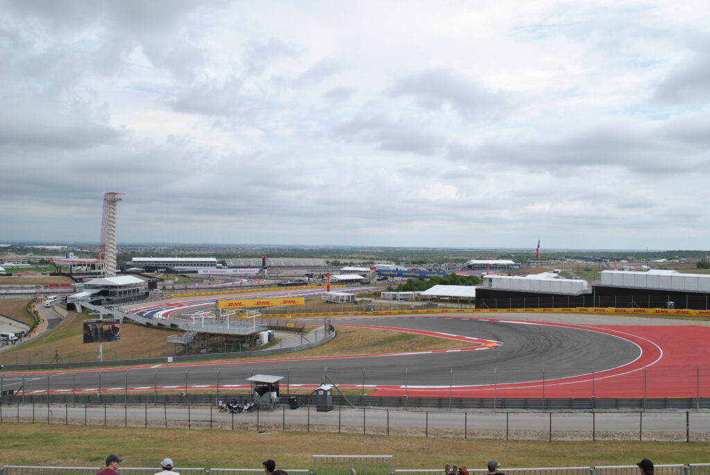 Full view of the T1 and downhill towards T2 from the middle of the T1 Grandstand.