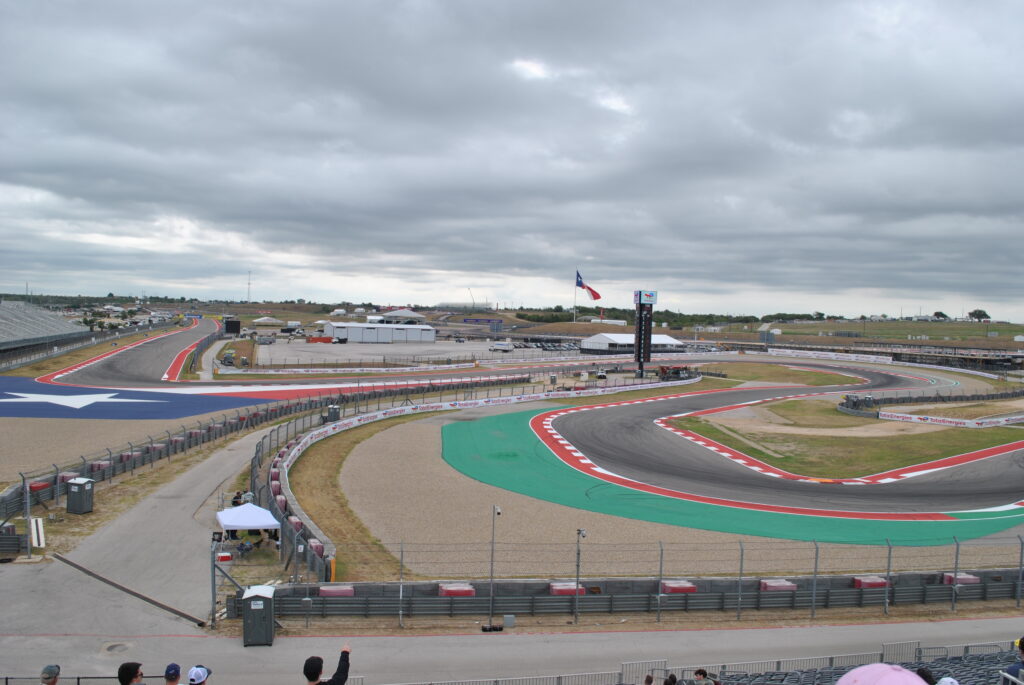 View of the back straight into T12, T13, T14, T15 from the left-most side of the left T15 Grandstands.