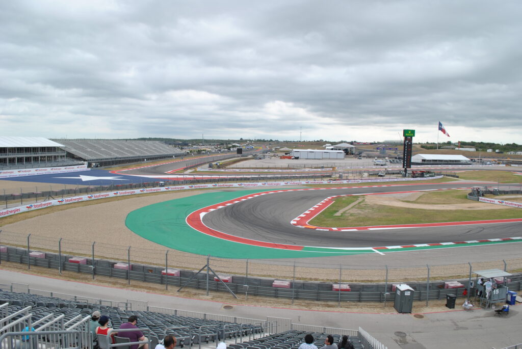 View of the back straight into T12 and T15 as viewed from the right-most side of the left T15 Grandstand section.